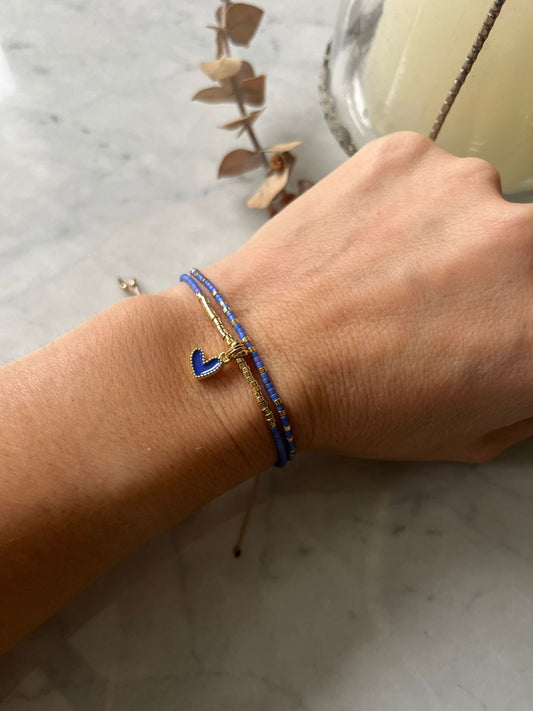 Pulsera cristales azules y detalles de baño de oro de 24k