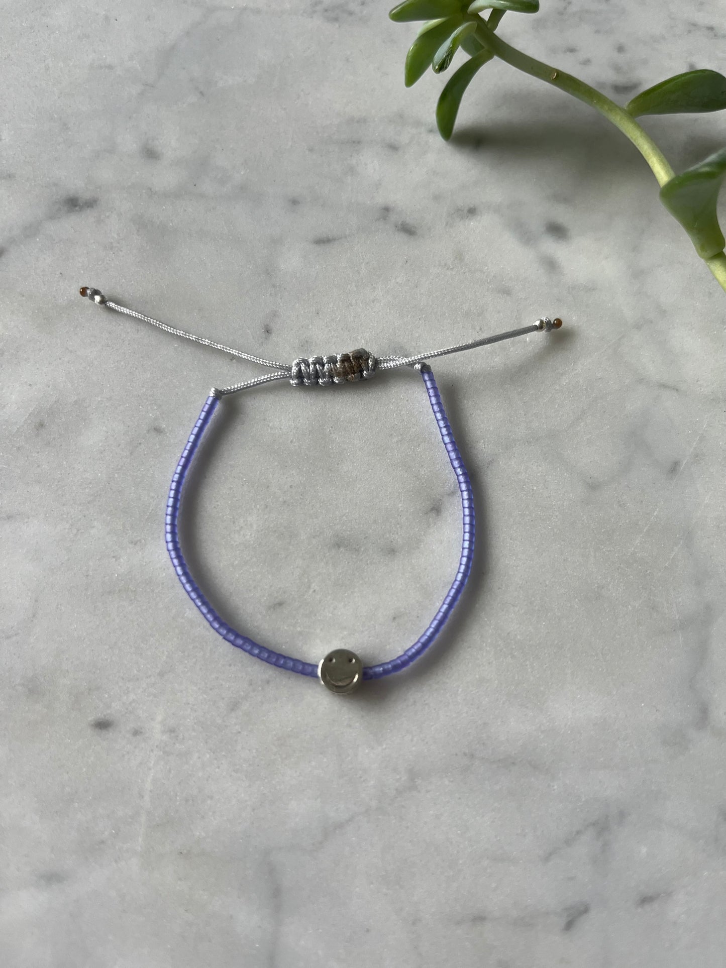💜 Pulsera Lila Sonriente
