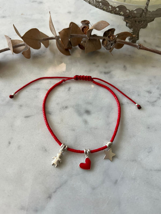 Pulsera de cristales rojos , niño, corazón rojo y estrella con detalles de plata