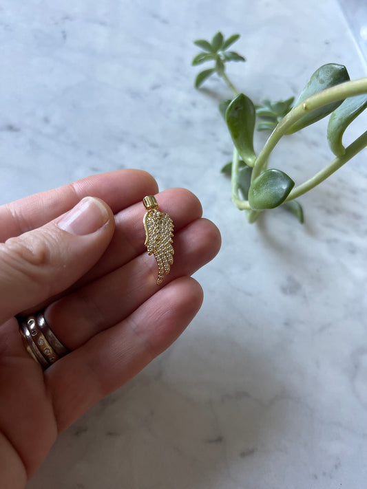 Ala baño de oro y circones