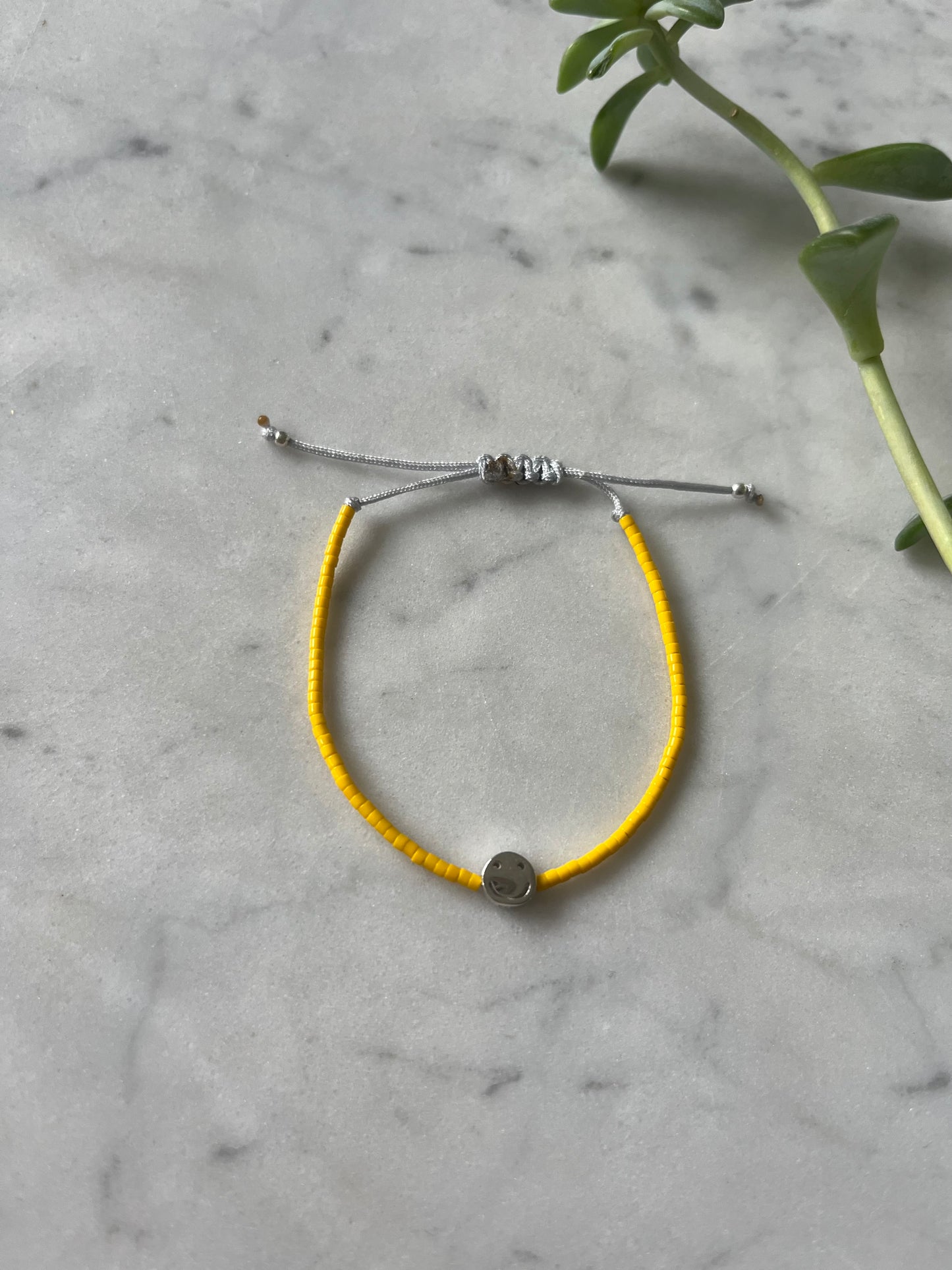 🌞 Pulsera Amarilla Sonriente