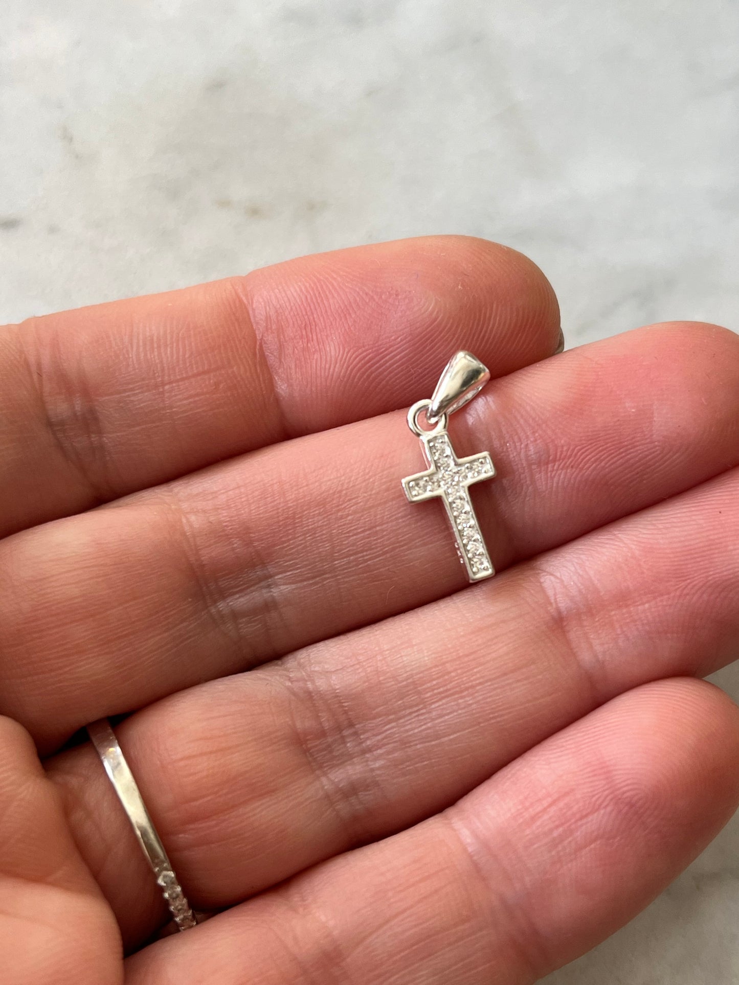 Cruz de circones plata