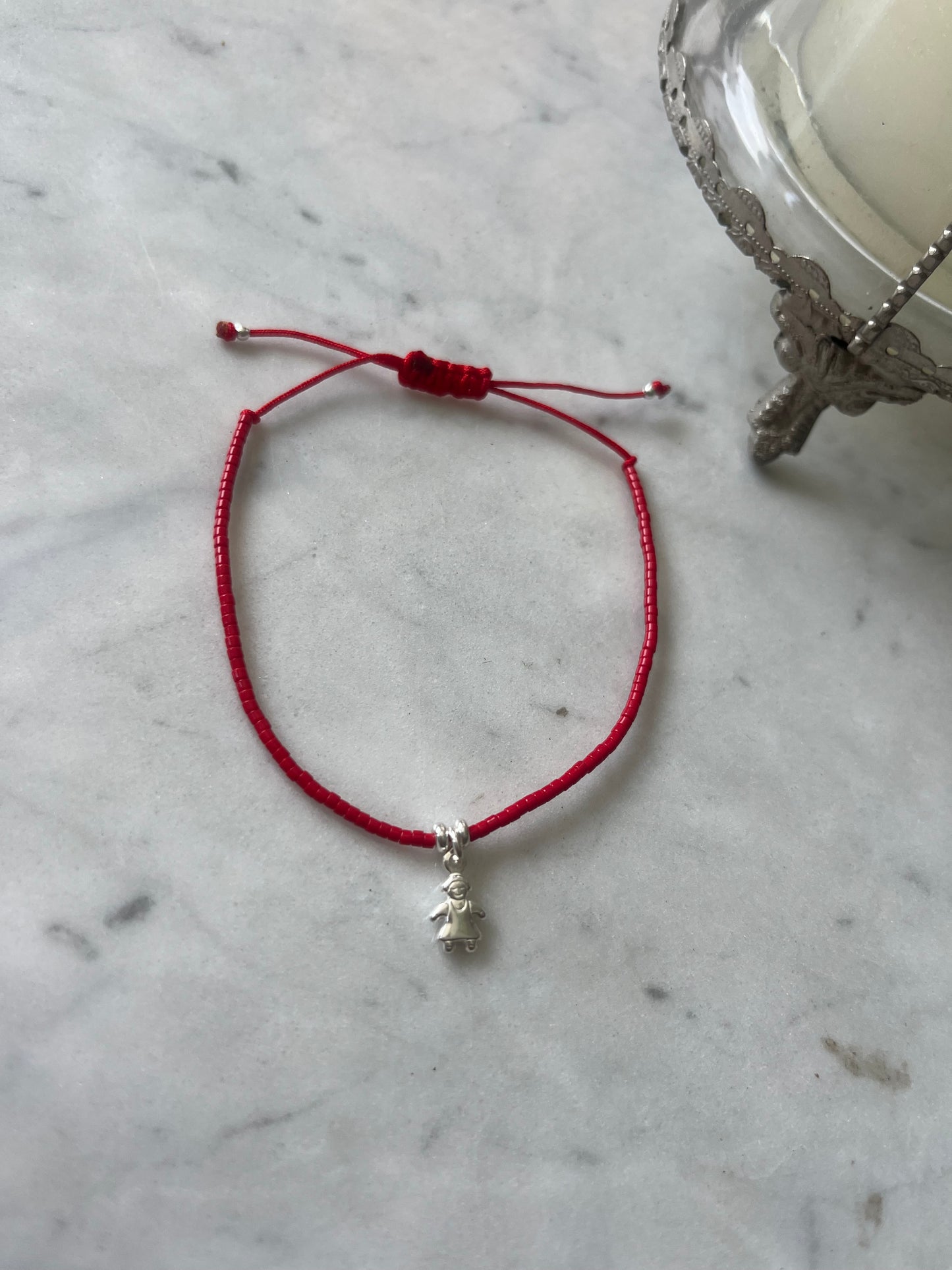 Pulsera hilo rojo Protegida
