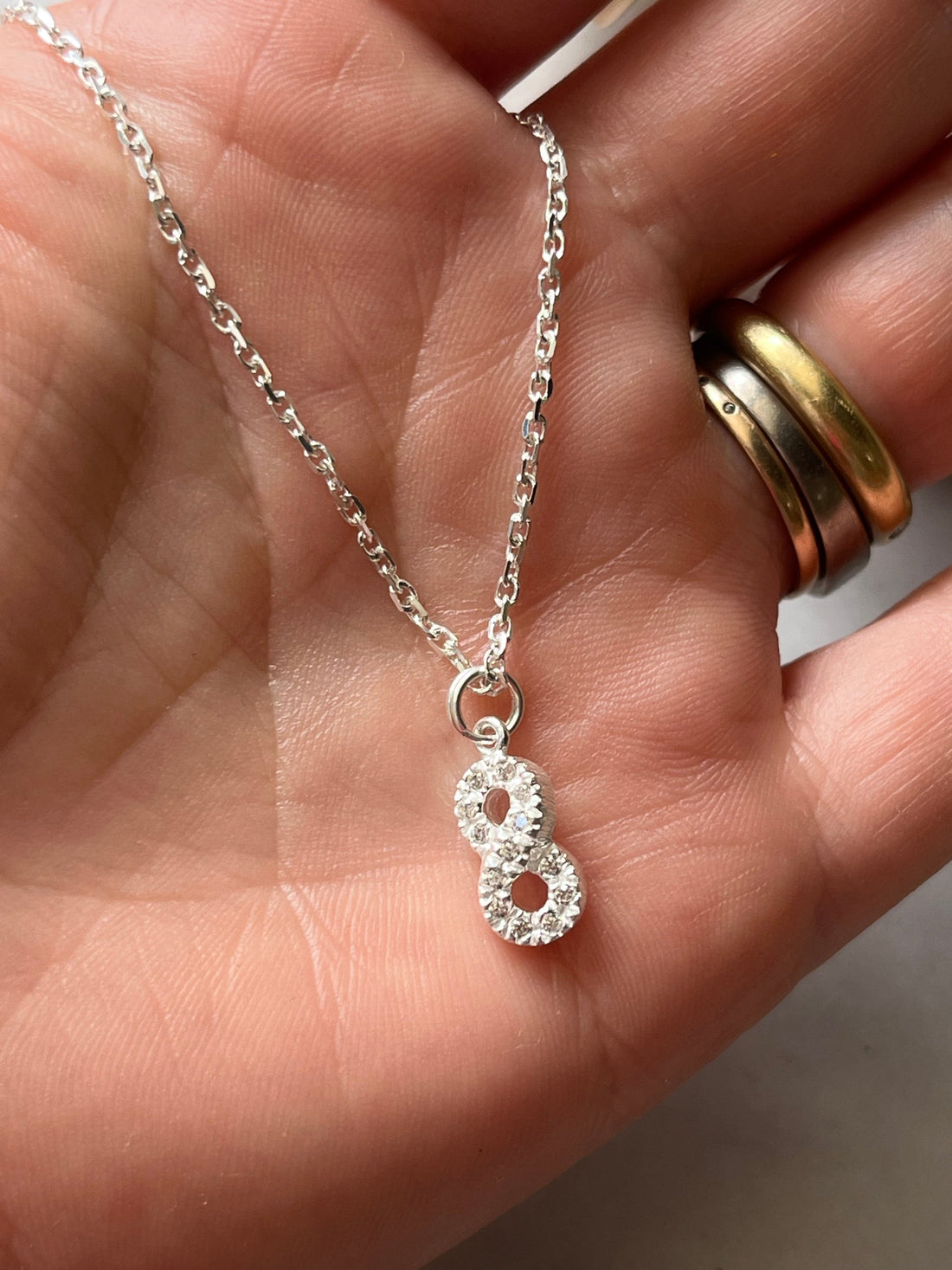 Dije infinito de plata con circones – Ana Diseño