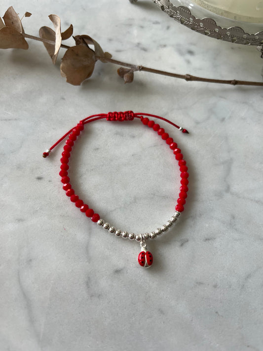 Pulsera hilo rojo de protección ,bolitas de plata y chinita