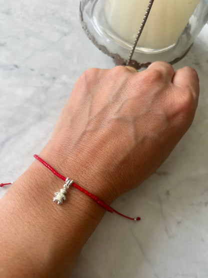 Pulsera hilo rojo Protegida