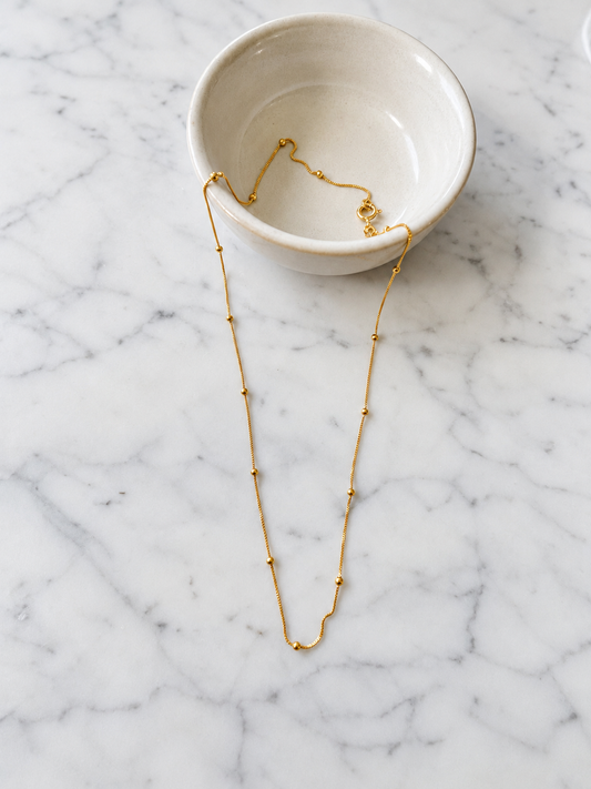 Cadena veneciana bolita baño de oro 24k puesta – Ana Diseño