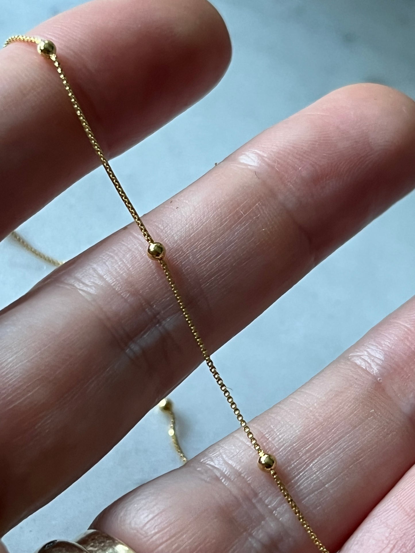 Cadena veneciana y bolitas