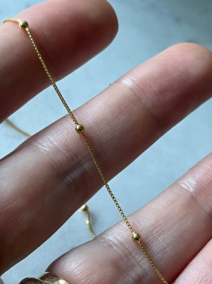 Cadena veneciana y bolitas