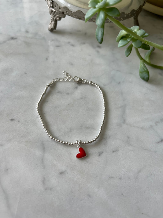 Pulsera de Plata con Bolitas y Corazón Rojo