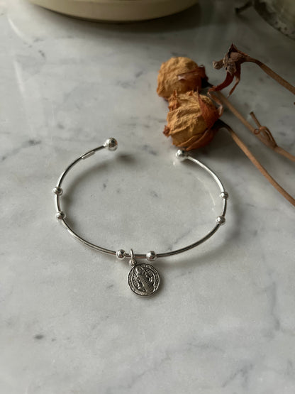 Esclava plata San Benito