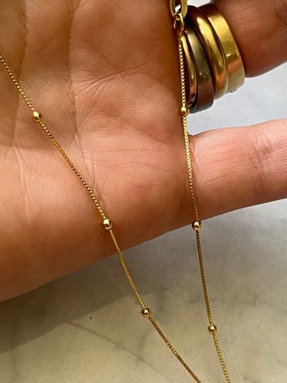 Cadena 45cm veneciana bolitas  baño oro 24k