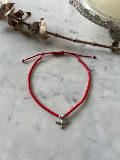 Pulsera hilo rojo con cristales rojos y Espíritu Santo de plata