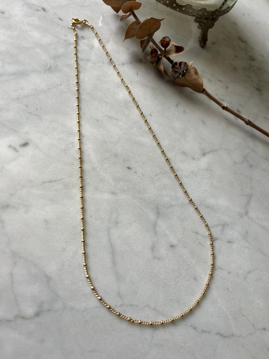 Cadena Grumet mini bolita 45cm baño de oro