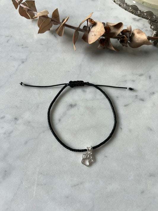 ulsera hilo negro con cristales y patita de plata 🐾🖤✨