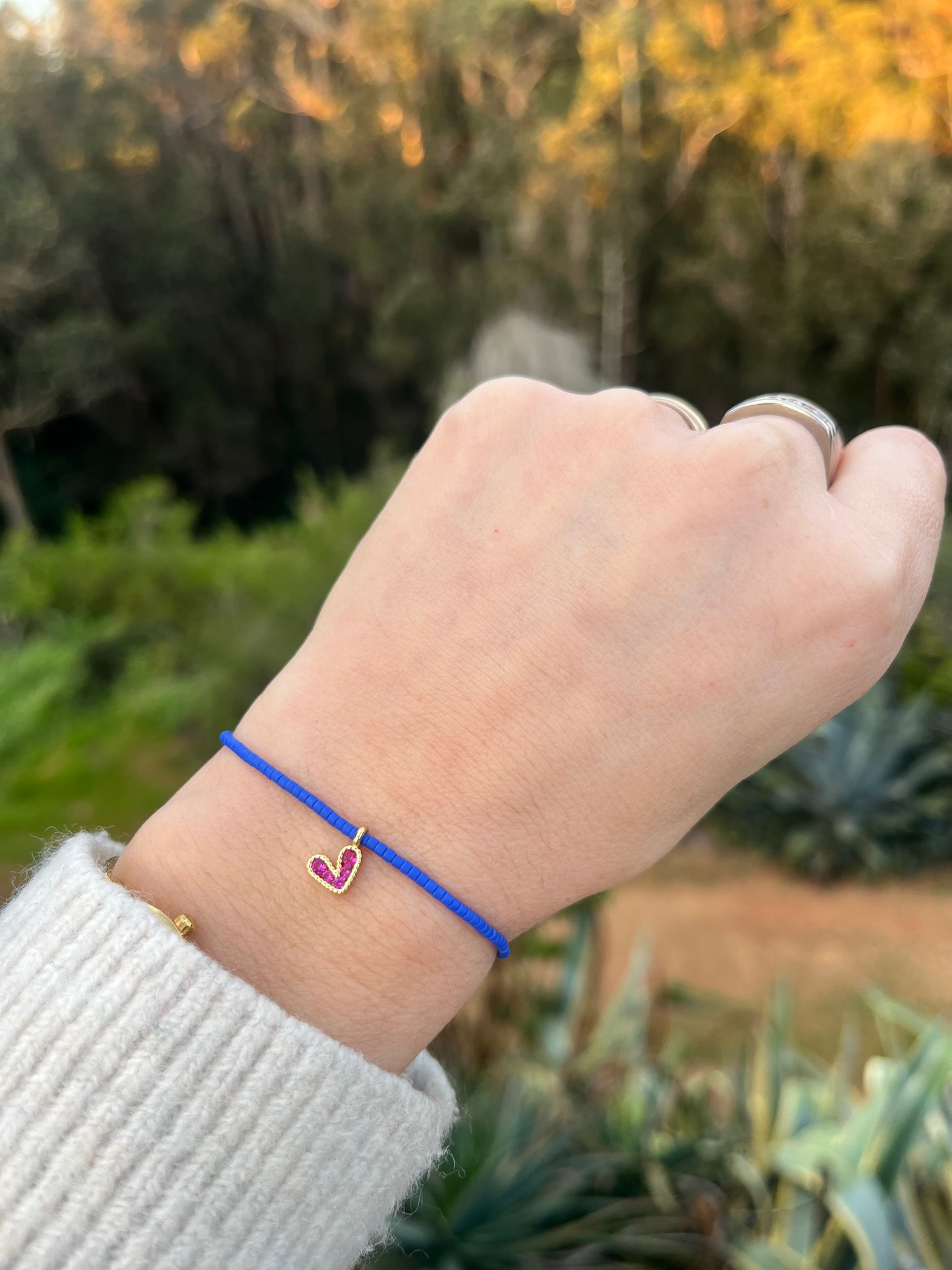Pulsera Azul Corazón Fucsia