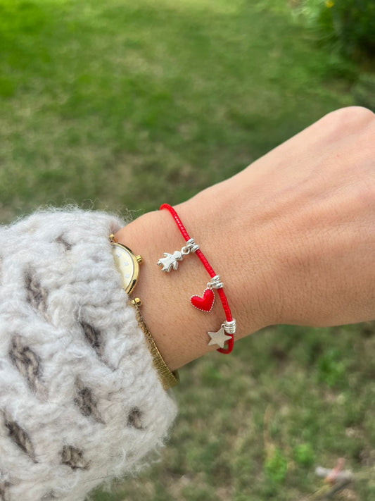 Pulsera de cristales rojos , niño, corazón rojo y estrella con detalles de plata
