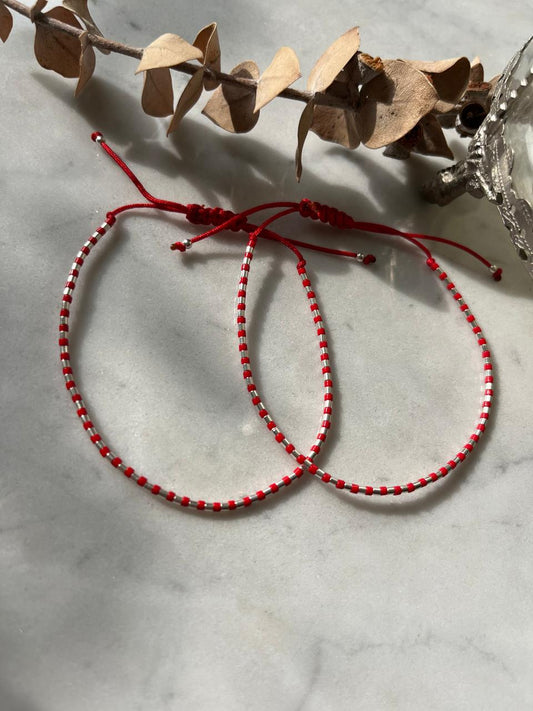 Pulsera plata y cristales rojos