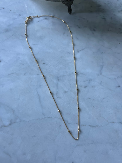 Cadena veneciana y bolitas