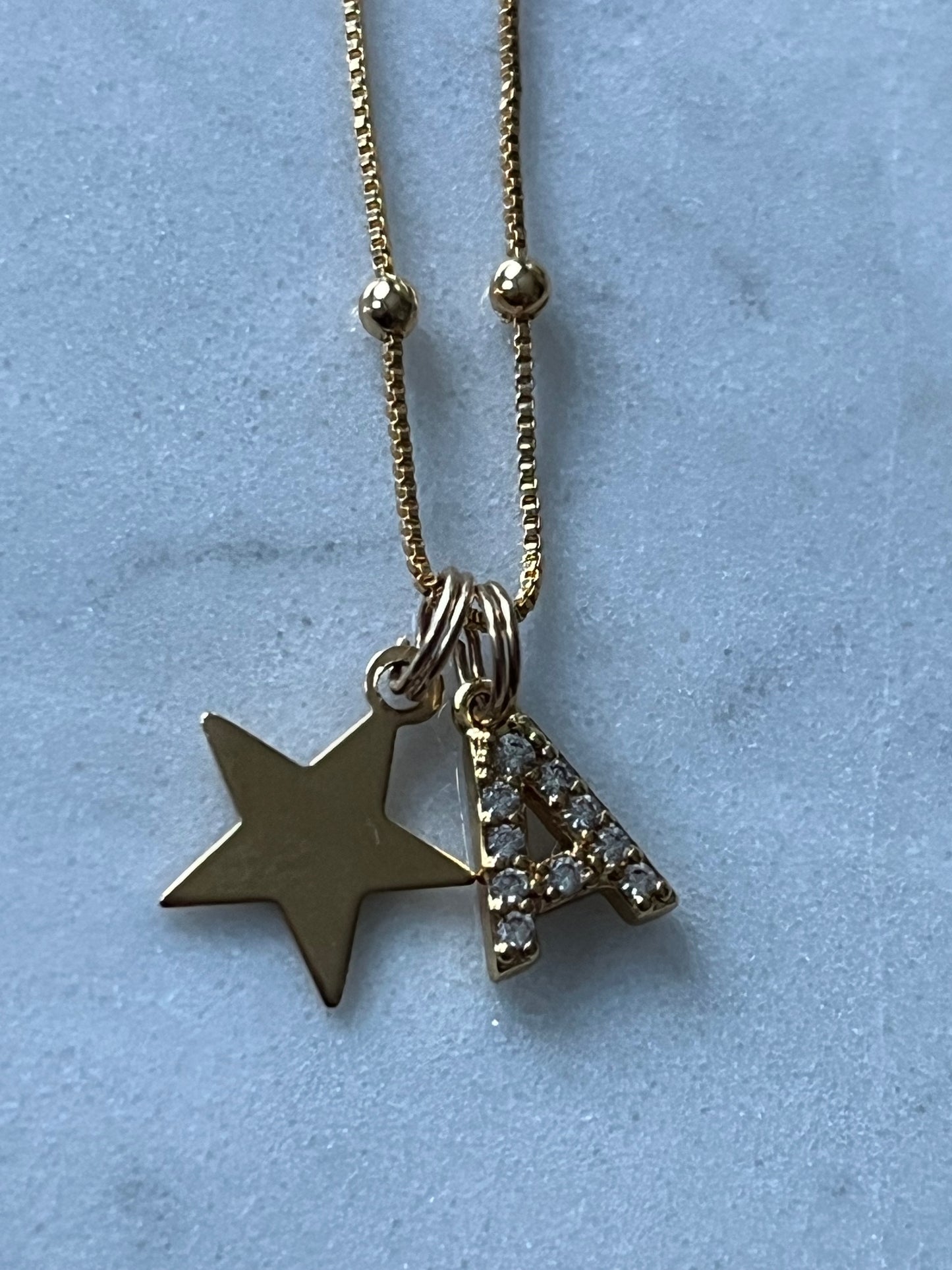 Cadena 49cm estrella y letra A