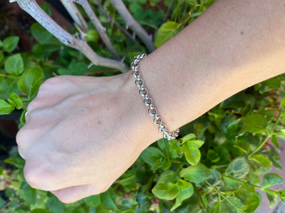 Pulsera  rolo broche timón