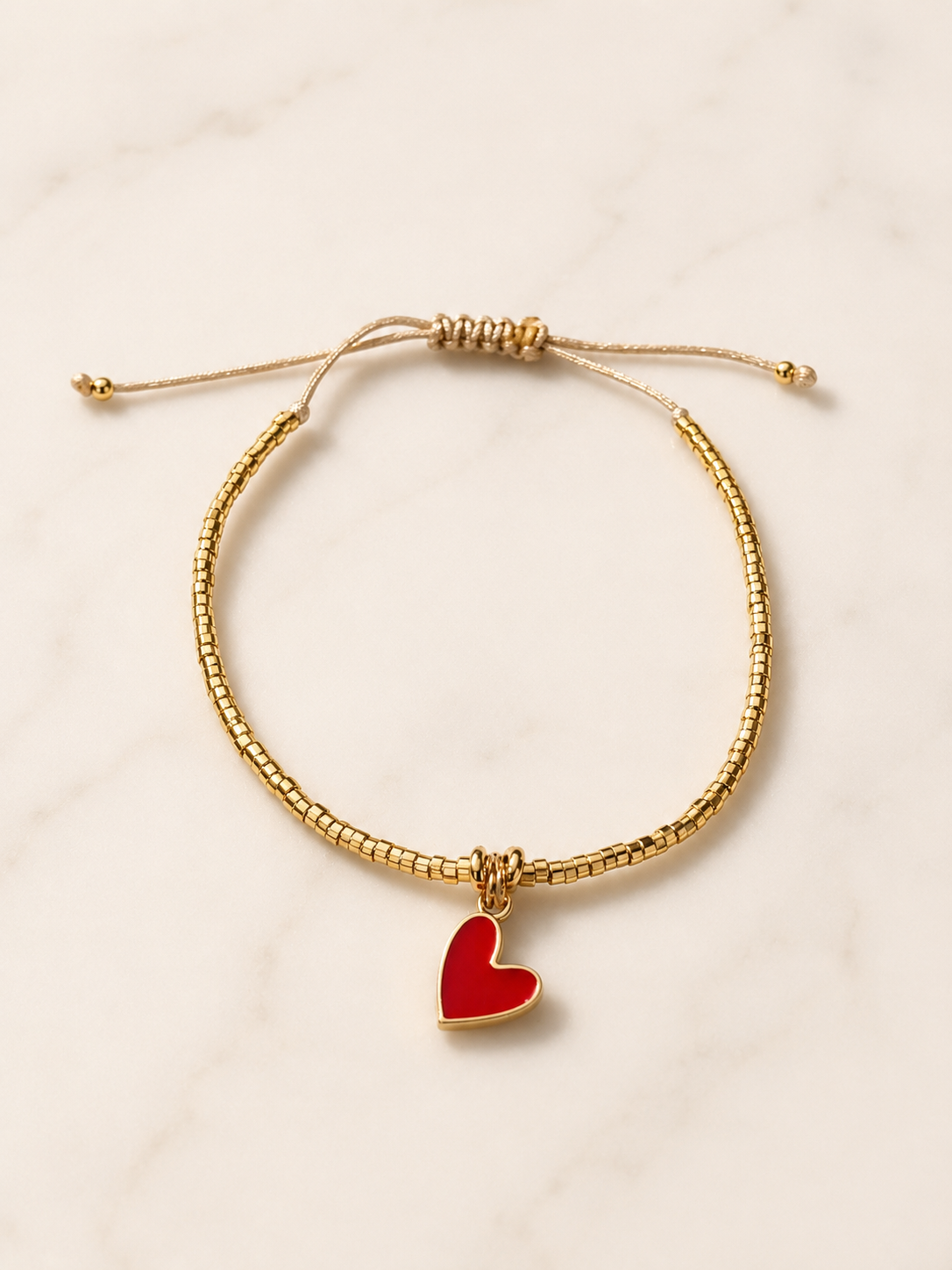 Pulsera baño de oro corazón rojo     Amore