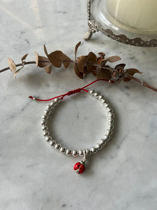 Pulsera hilo rojo de protección  Chinita - Plata y Suerte